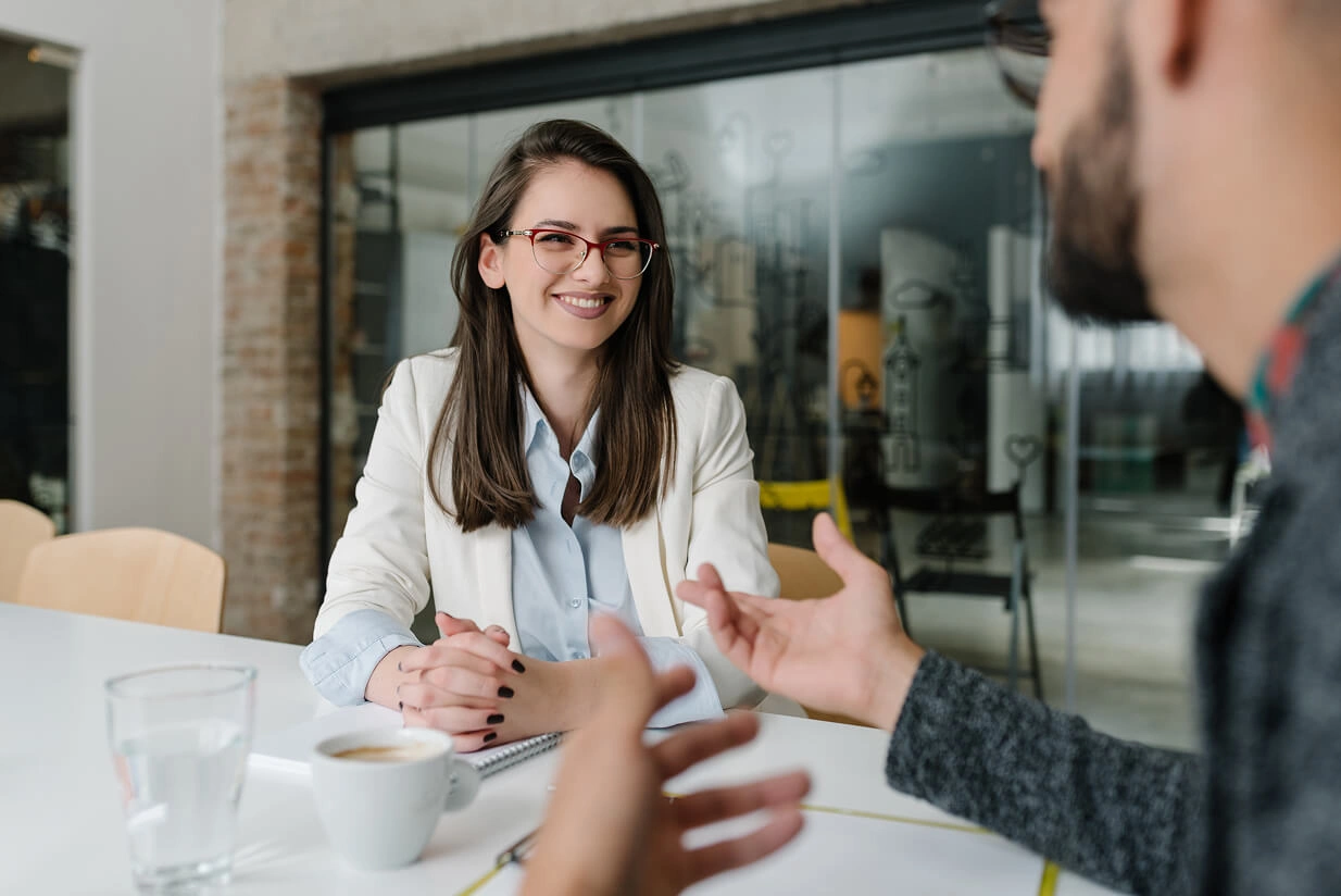 People talking at a table